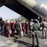 PAVN_prisoners_board_a_C-130_at_Phu_Quoc_14_February_1973-PS-ADJ | Seattle’s Japanese Community News – North American Post